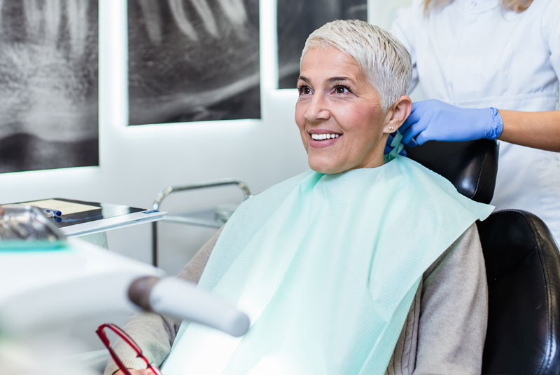 dental patient smiling in dental office